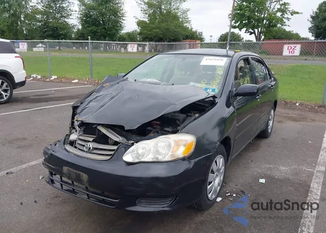 2003 Toyota Corolla Le z USA, uszkodzony, nr VIN JTDBR32E130022943